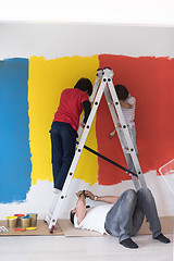 Image showing boys painting wall