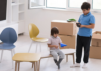 Image showing boys in a new modern home