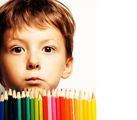 Image showing little cute boy with color pencils close up smiling