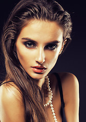 Image showing beauty young  woman with jewellery close up, luxury portrait of rich real girl, party makeup