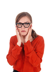 Image showing Scared young woman with glasses.