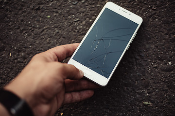 Image showing Smartphone with a broken screen.