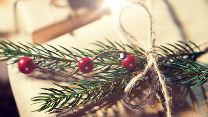 Image showing close up of christmas gift with fir brunch