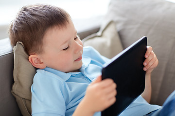 Image showing little boy with tablet pc computer at home