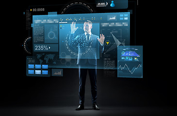 Image showing businessman in suit with virtual projection