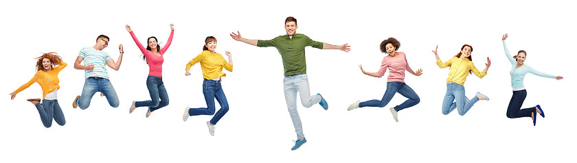 Image showing happy people or friends jumping in air over white