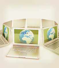 Image showing internet, global network, computers around globe. 3d render. Vin