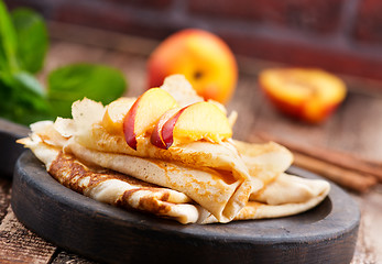 Image showing pancake with peach 