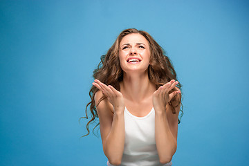 Image showing Portrait of young woman with shocked facial expression