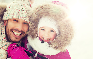 Image showing happy family in winter clothes outdoors