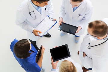 Image showing doctors with cardiogram and and tablet pc