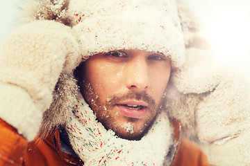 Image showing face of man in winter clothes outdoors