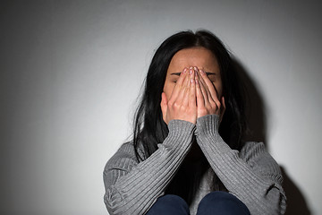 Image showing sad crying woman suffering from domestic violence