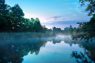 Image showing Morning fog on a calm river