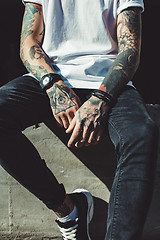 Image showing Crop tattooed man outside