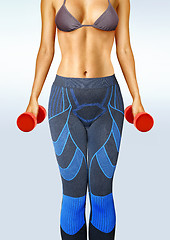 Image showing woman working out with dumbbells