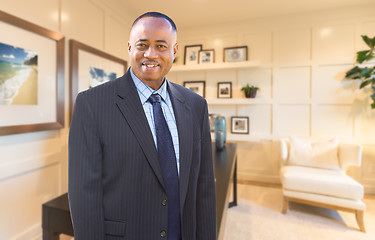 Image showing Handsome African American Businessman Inside His Home Office.