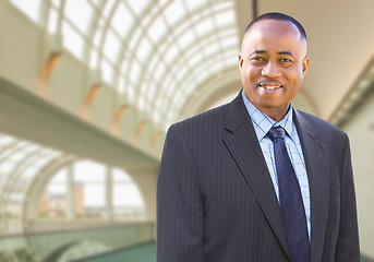 Image showing Handsome African American Businessman Inside Corporate Building.