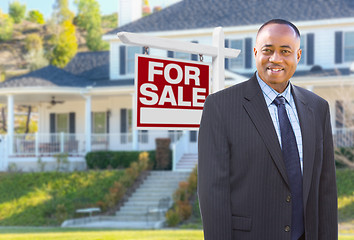 Image showing African American Agent In Front of Beautiful Custom House and Fo