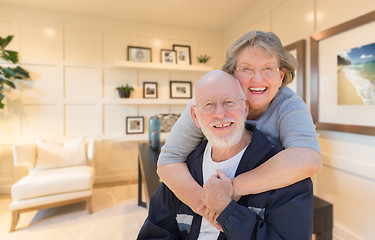 Image showing Loving Senior Couple Inside Their Home Office.