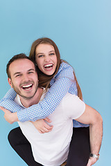 Image showing young man piggybacking his girlfriend