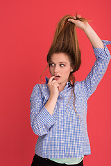 Image showing woman playing with her long silky hair