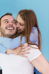 Image showing young man piggybacking his girlfriend