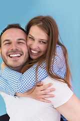 Image showing young man piggybacking his girlfriend