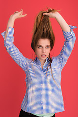 Image showing woman playing with her long silky hair