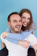 Image showing young man piggybacking his girlfriend