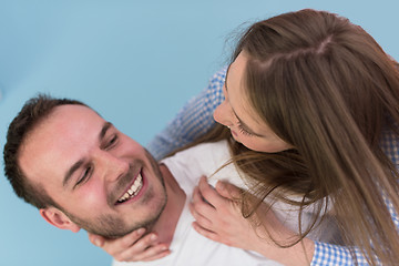 Image showing young man piggybacking his girlfriend