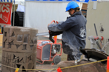 Image showing Cutting Concrete with Chain Saw