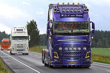Image showing Customized Purple Volvo FH16 in Truck Convoy