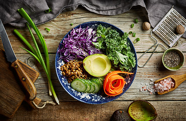 Image showing Vegan bowl on wooden table