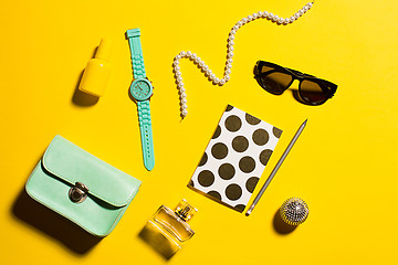 Image showing Still life of fashion woman, objects on yellow