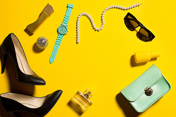 Image showing Still life of fashion woman, objects on yellow