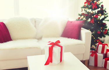 Image showing close up of christmas gift box on table at home