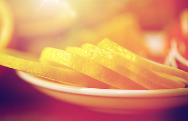 Image showing close up of lemon slices on plate