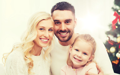 Image showing happy family at home with christmas tree