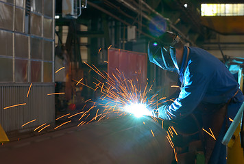 Image showing Welder performs welding large diameter pipe