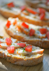 Image showing Bruschetta with tomato and chicken 