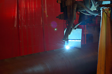 Image showing Welder machine performs welding 