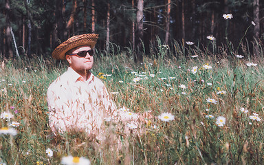 Image showing Man Rest On The Forest Lawn