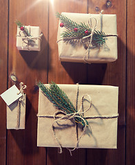 Image showing close up of christmas gifts with fir brunch