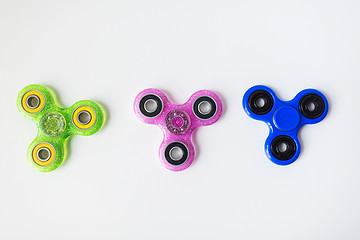 Image showing three fidget spinners on white background