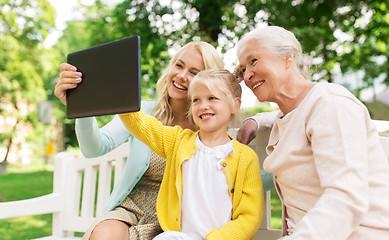 Image showing mother, daughter and grandmother with tablet pc