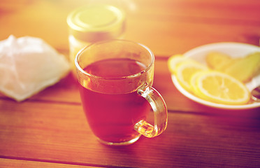 Image showing tea cup with lemon and honey