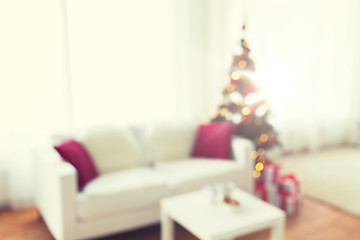 Image showing blurred living room with christmas tree background