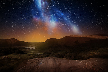 Image showing mountain landscape over night sky or space