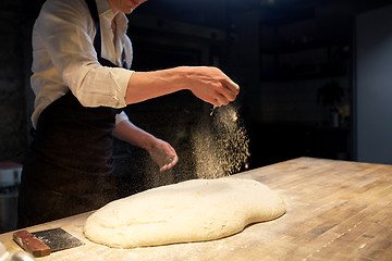 Image showing chef or baker making bread dough at bakery